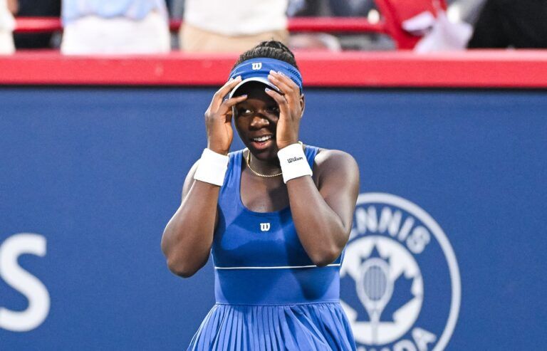 Victoria Mboko (CAN) reacts after winning her fourth round match against Coco Gauff (USA) at IGA Stadium.