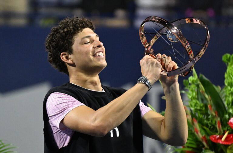 Ben Shelton (USA) lifts the winners trophy after defeating Karen Khachanov during the singles final at Sobeys Stadium.
