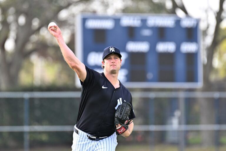 New York Yankees pitcher Gerrit Cole (45) warms up during a spring training workout  at George M. Steinbrenner Field.