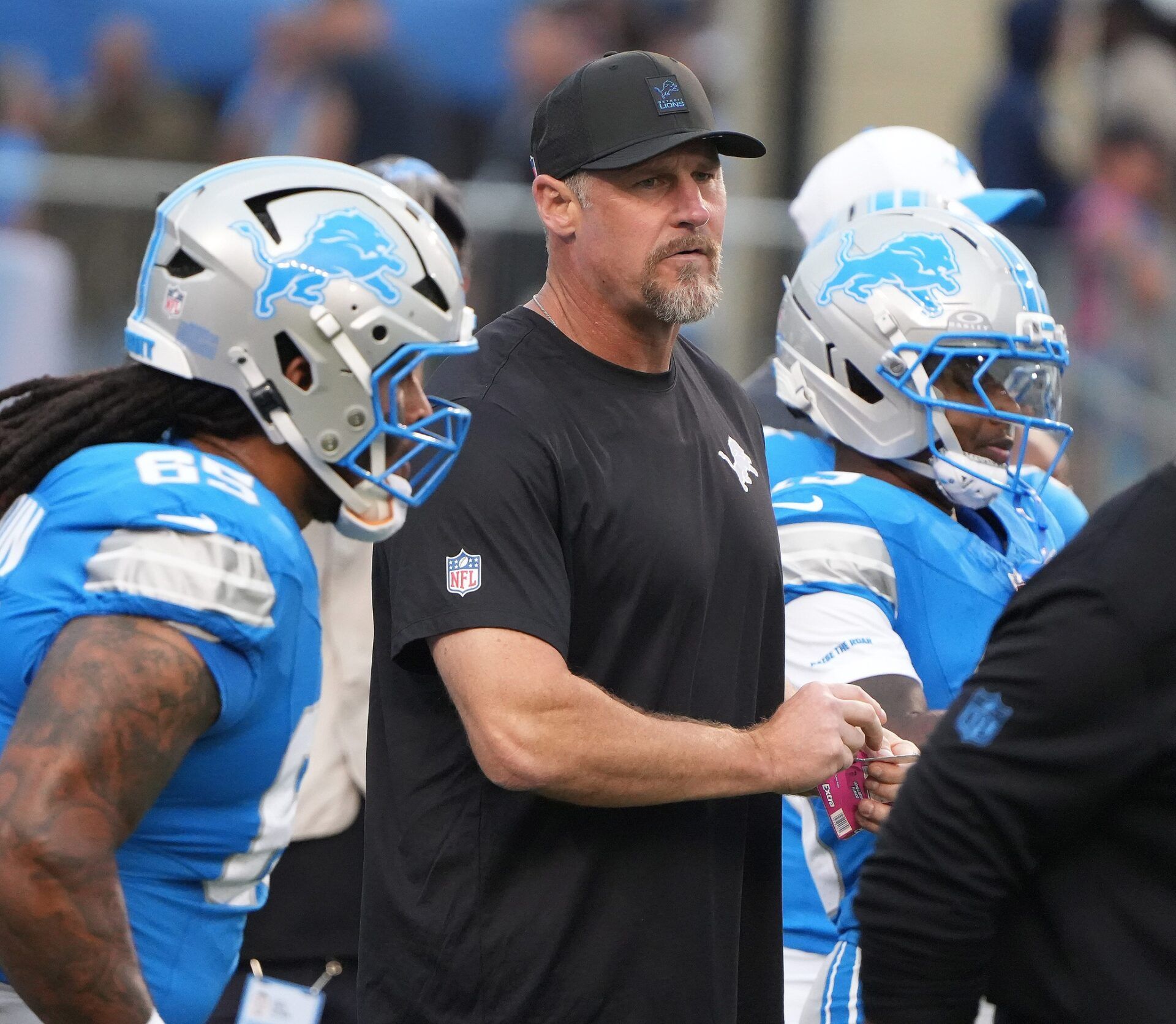 Detroit Lions head coach Dan Campbell works with his team in pre-game at the Pro Football Hall of Fame game at Tom Benson Hall of Fame Stadium. Thursday, July 31, 2025.