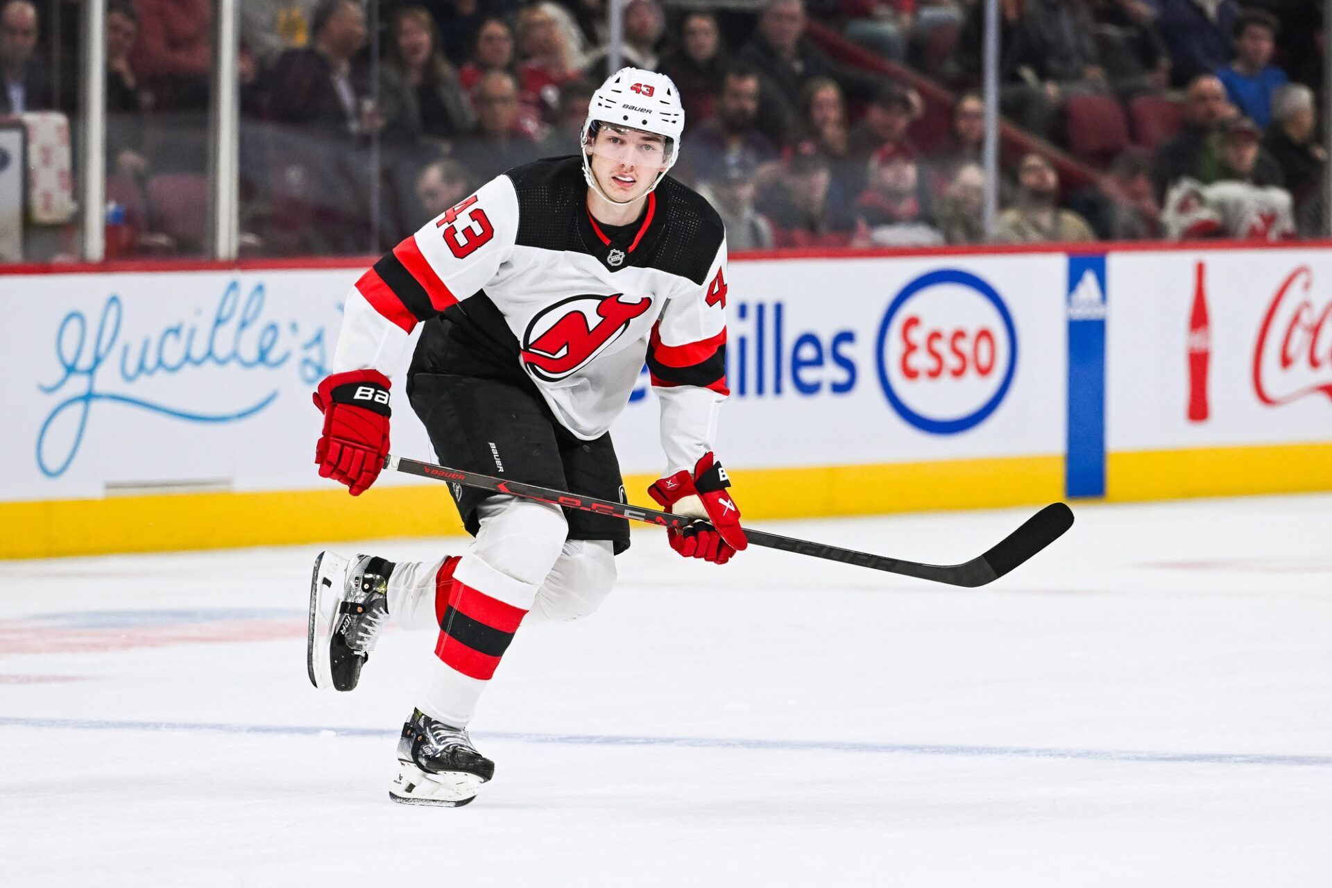 New Jersey Devils defenseman Luke Hughes (43) skates towards the play against the Montreal Canadiens during the first period at Bell Centre.