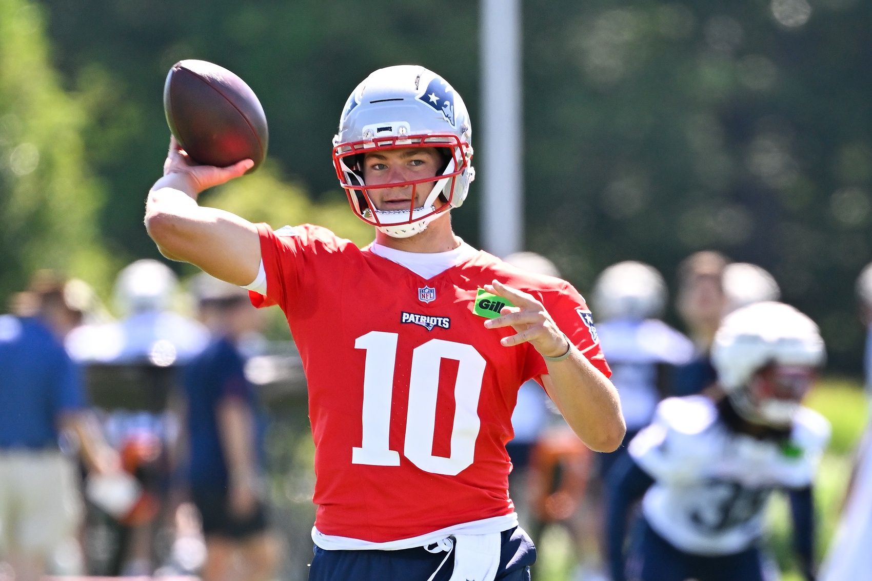 New England Patriots quarterback Drake Maye (10) throws a pass during training camp at Gillette Stadium.