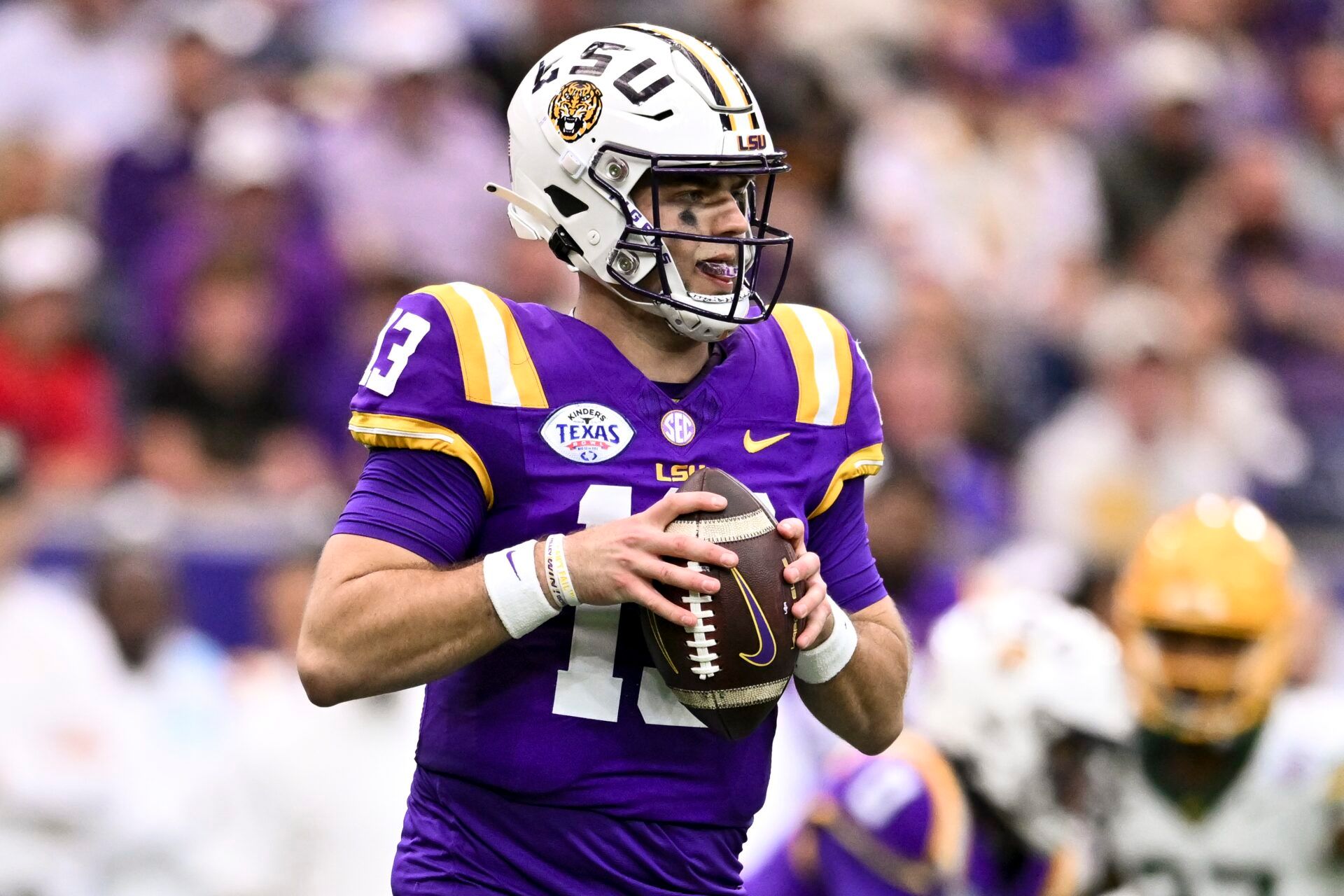 LSU Tigers quarterback Garrett Nussmeier (13) throws a pass during the first half against the Baylor Bears at NRG Stadium. The Tigers defeat the Bears 44-31.
