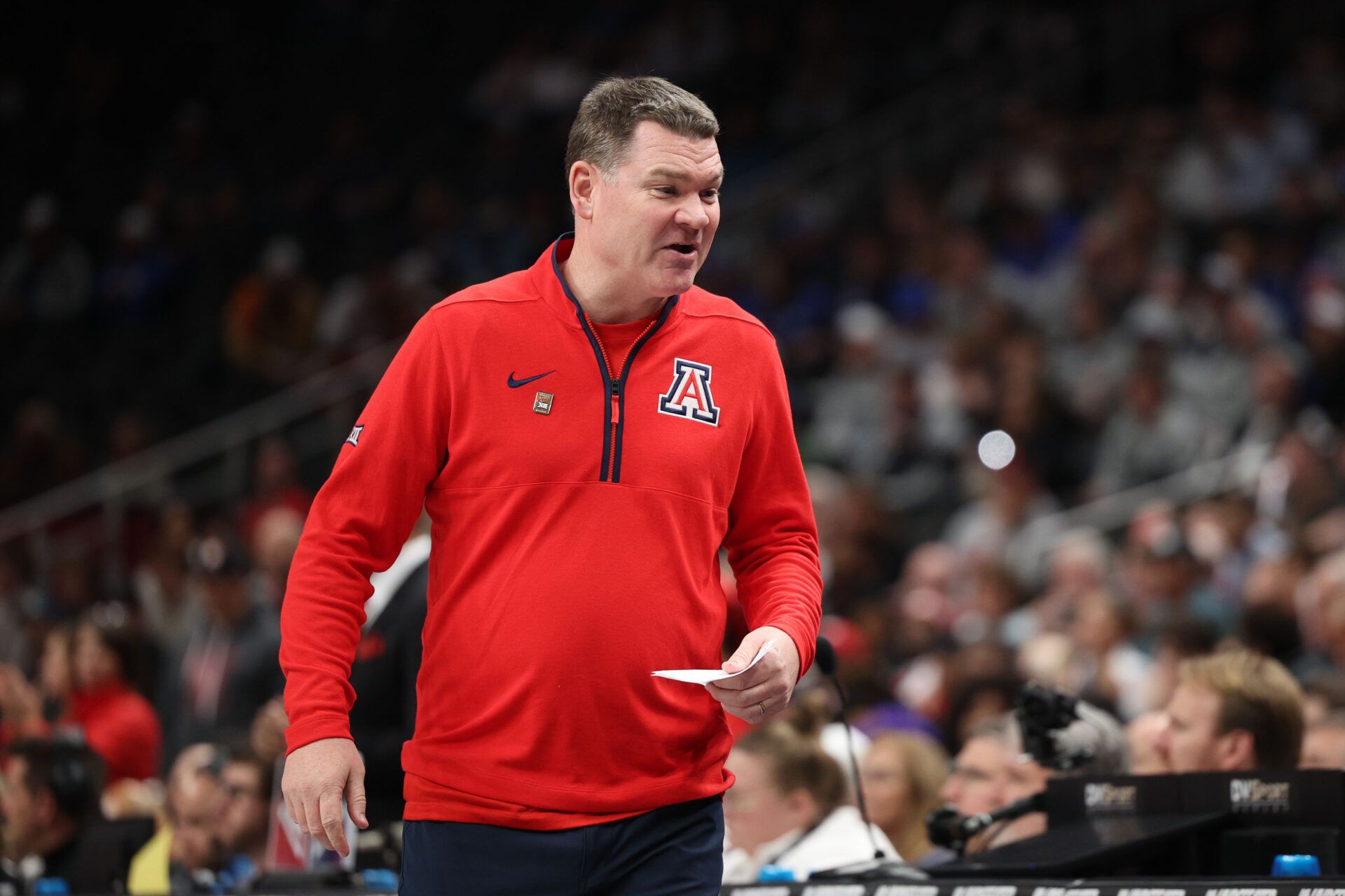 Arizona Wildcats head coach Tommy Lloyd during the first half against the Houston Cougars for the Big 12 Conference Tournament Championship game at T-Mobile Center.