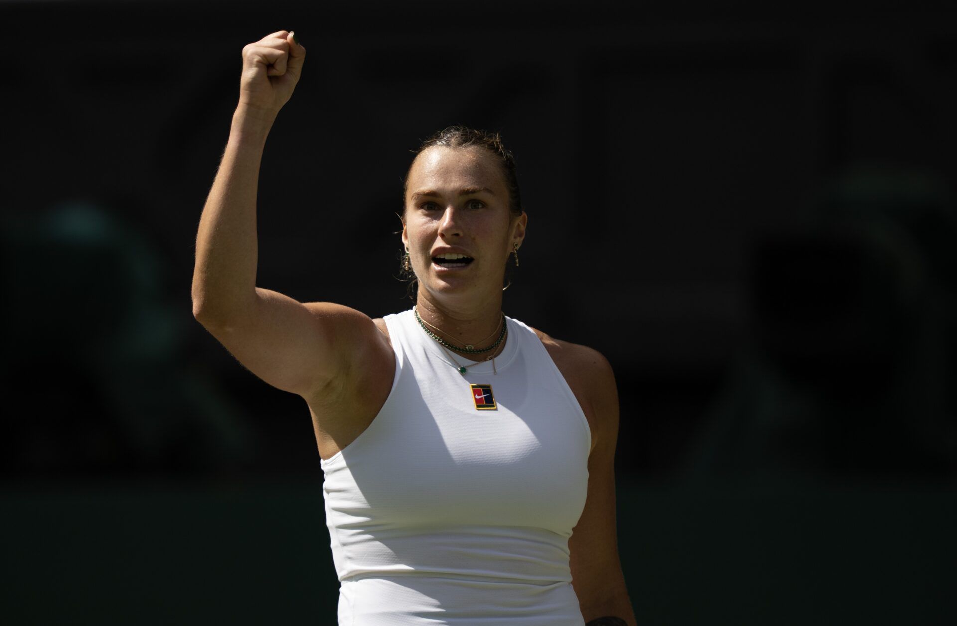 Aryna Sabalenka reacts to a point during her match against Amanda Anisimova of the United States on day 11 at All England Lawn Tennis and Croquet Club.