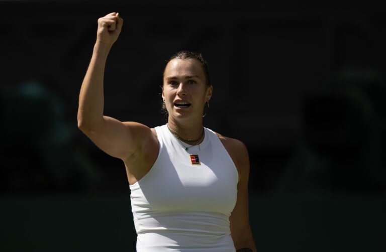 Aryna Sabalenka reacts to a point during her match against Amanda Anisimova of the United States on day 11 at All England Lawn Tennis and Croquet Club.