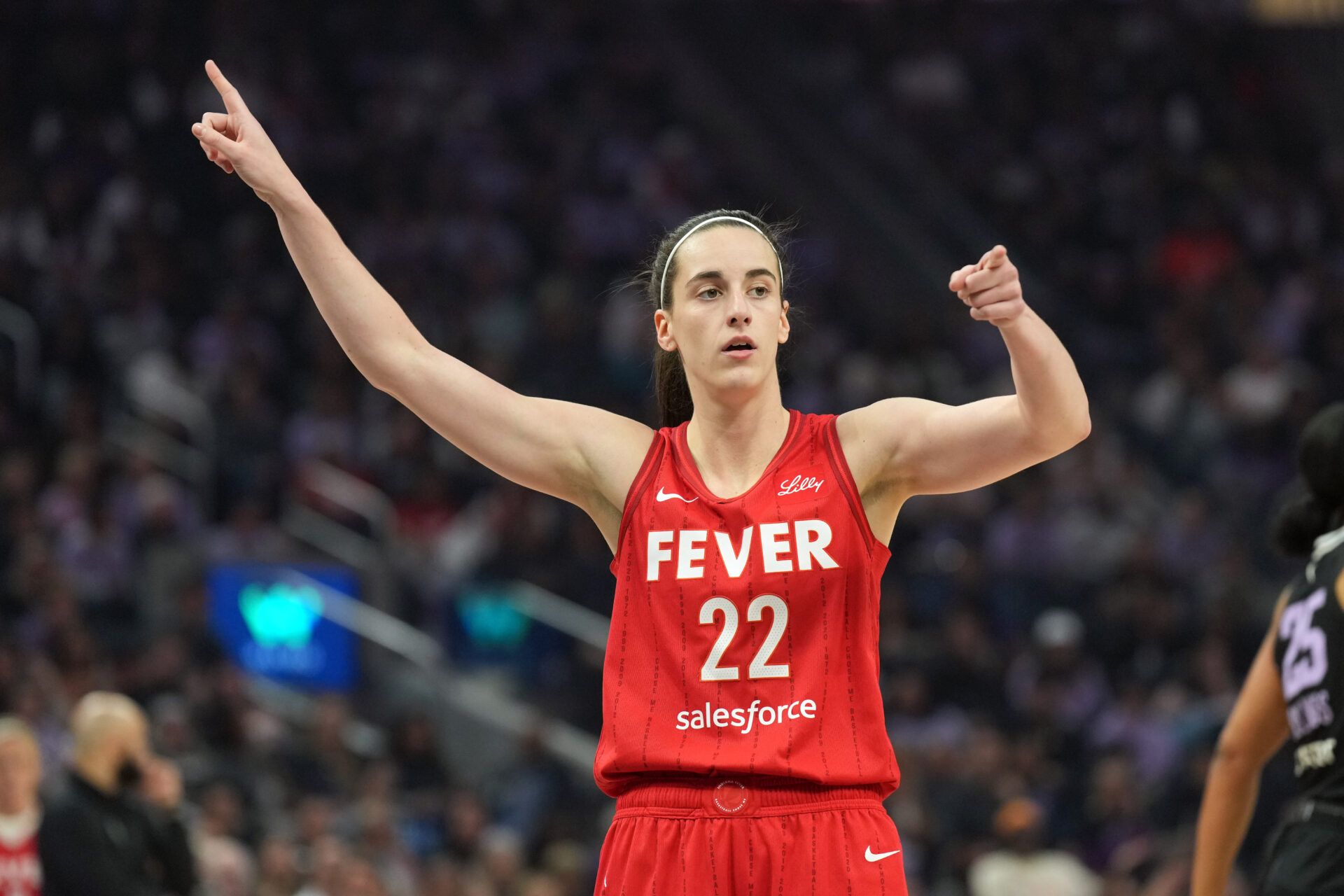 Indiana Fever guard Caitlin Clark (22) gestures during the first quarter against the Golden State Valkyries at Chase Center.