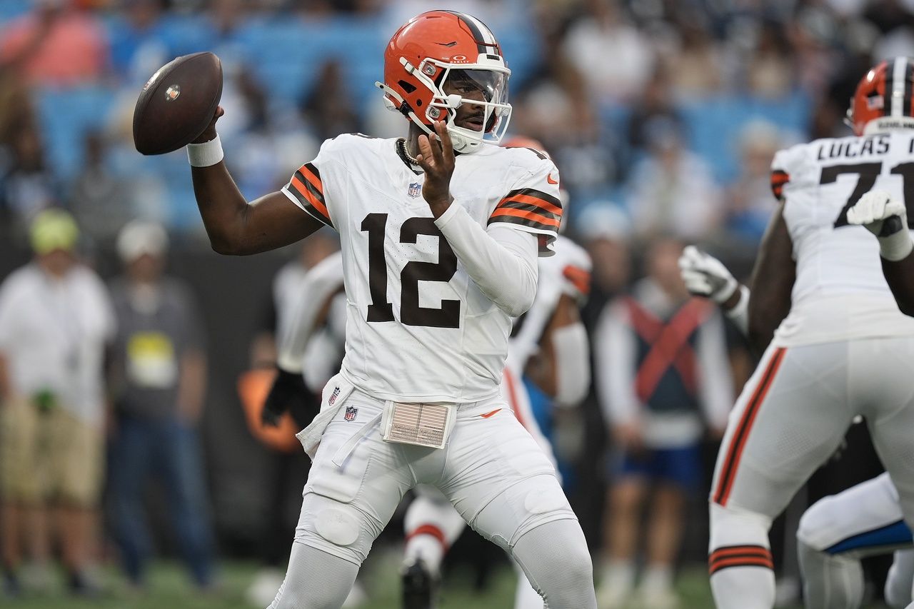 Cleveland Browns quarterback Shedeur Sanders (12) looks to pass against the Carolina Panthers during the first quarter at Bank of America Stadium.