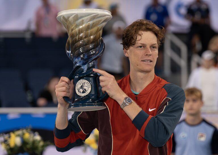 Aug 19 2024; Cincinnati, OH, USA; Jannik Sinner of Italy poses with the Rookwood Cup trophy after winning the men’s singles final against Frances Tiafoe of the United States on day seven of the Cincinnati Open.