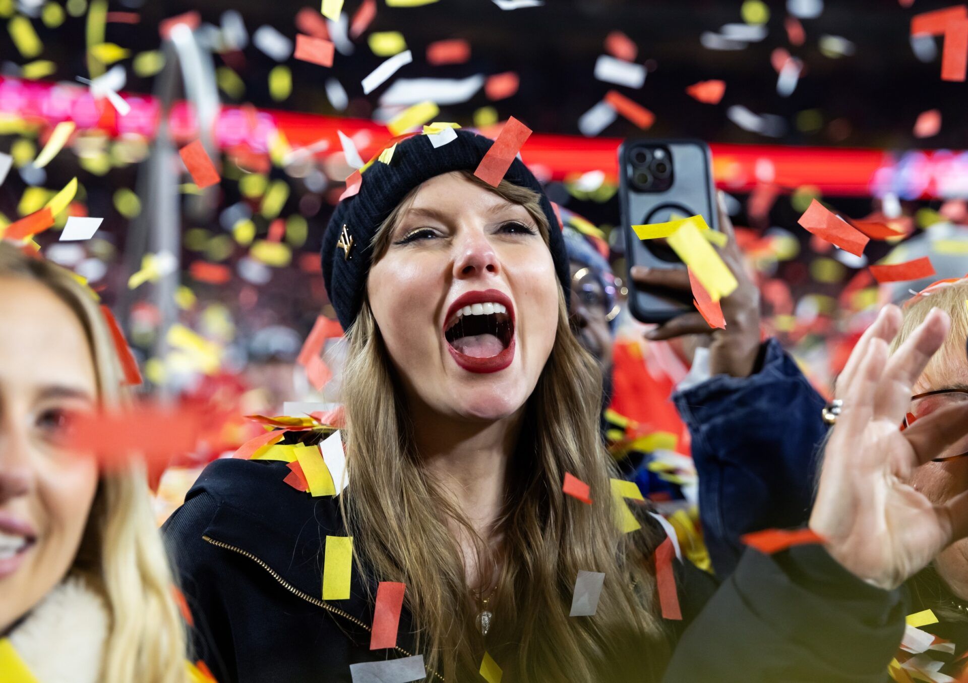 Recording artist Taylor Swift celebrates after the AFC Championship game against the Buffalo Bills at GEHA Field at Arrowhead Stadium.