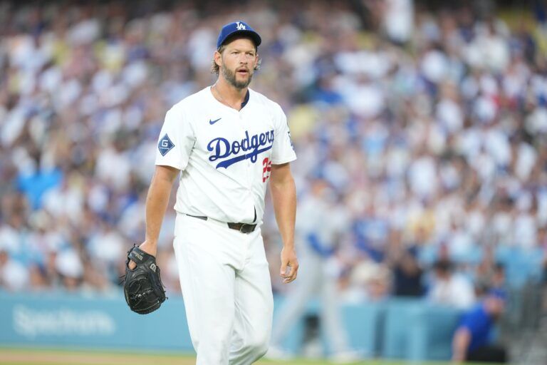Los Angeles Dodgers starting pitcher Clayton Kershaw (22) walks off the field after the first inning against Toronto Blue Jays at Dodger Stadium.