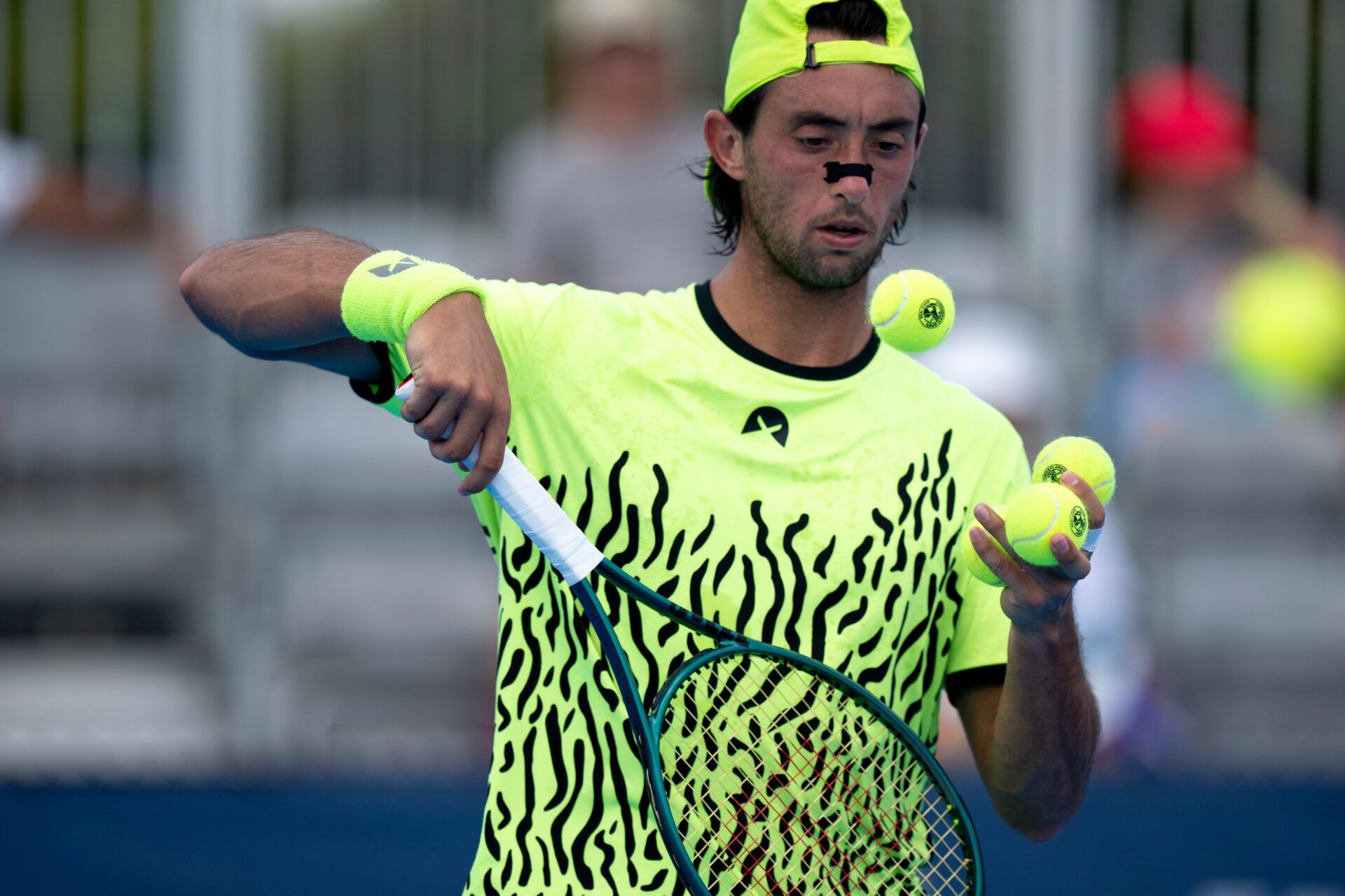 Agustín Tirante, of Argentina, prepares to serve to Luca Nardi, of Italy, during the Cincinnati Open at the Lindner Family Tennis Center in Mason, Ohio, on Aug. 8, 2025.