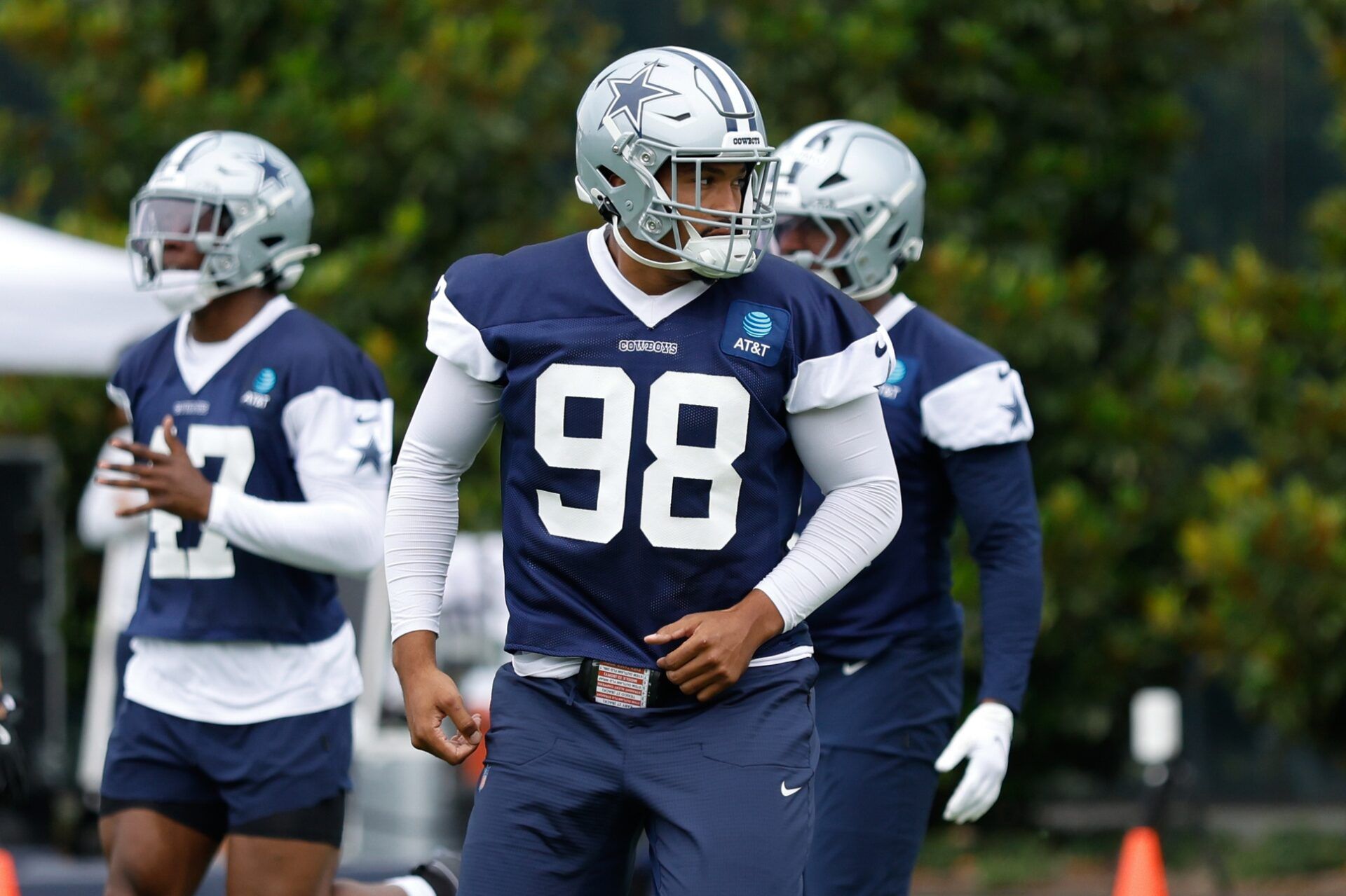 Dallas Cowboys defensive end Payton Turner (98) goes through a drill during practice at the Ford Center at the Star Training Facility in Frisco, Texas.