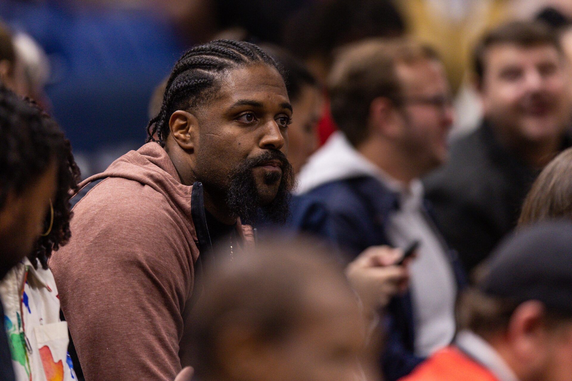 New Orleans Saints defensive end Cam Jordan looks on at the game between the New Orleans Pelicans and the Phoenix Suns during the first half at Smoothie King Center.