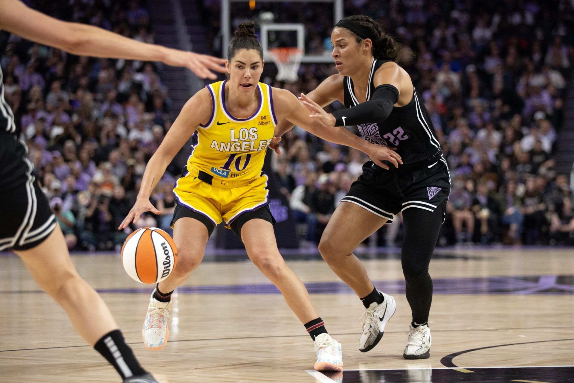 Los Angeles Sparks guard Kelsey Plum (10) dribbles around Golden State Valkyries guard Veronica Burton (22) during the fourth quarter at Chase Center.