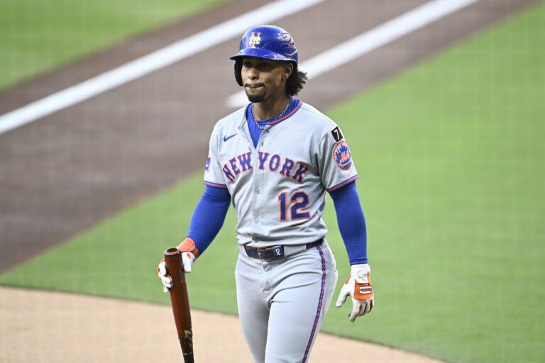 New York Mets shortstop Francisco Lindor (12) walks back to the dugout after striking out during the first inning against the San Diego Padres at Petco Park.