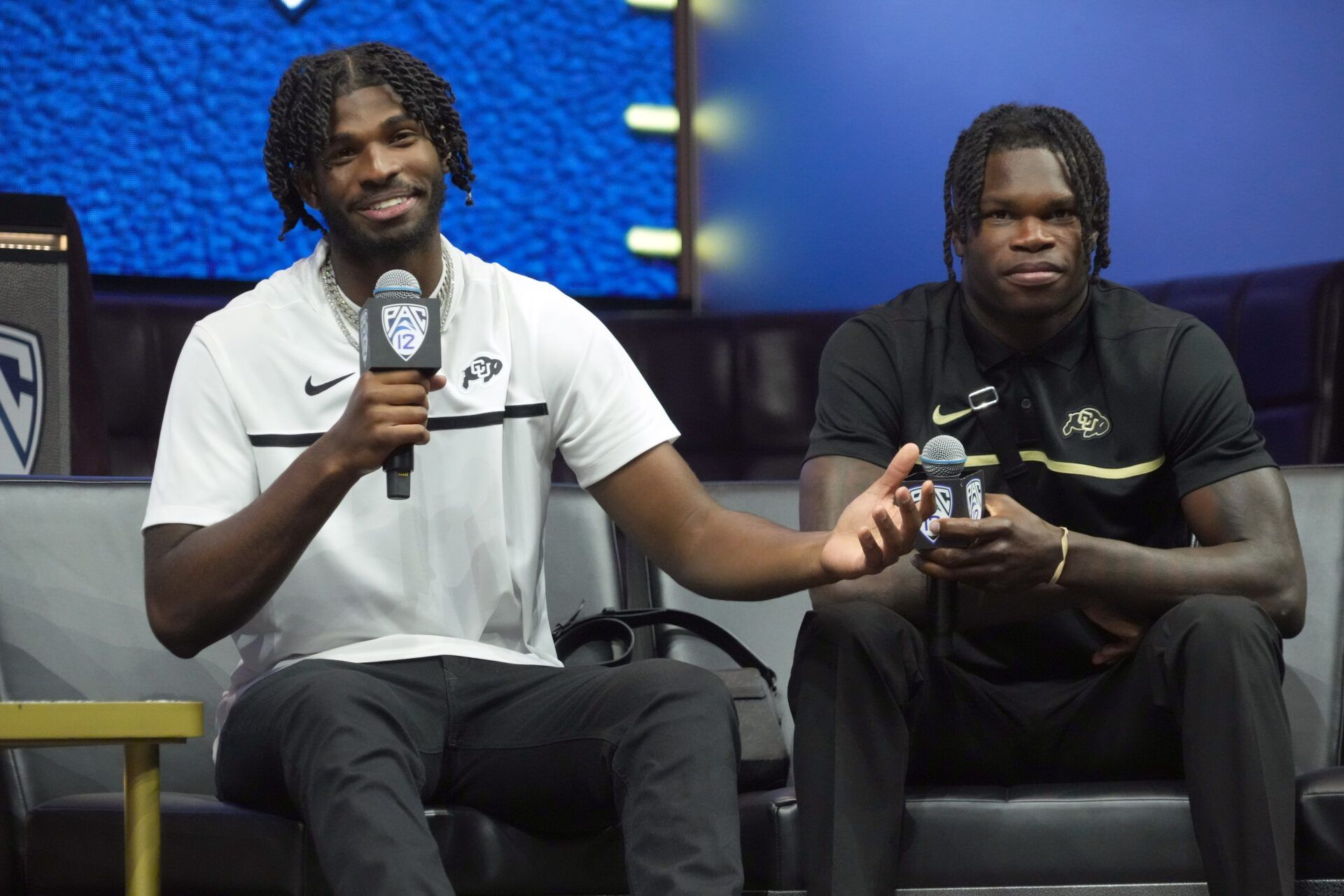 Colorado Buffaloes quarterback Shadeur Sanders (left) and receiver Travis Hunter during Pac-12 Media Day at Resorts World Las Vegas.