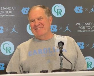 UNC football coach Bill Belichick speaks with media members inside the Kenan Football Center before the Tar Heels' first preseason practice on Aug. 2, 2025.