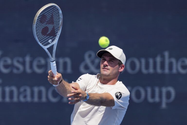 Tommy Paul (USA) returns a shot against Pedro Martinez (ESP) during the Cincinnati Open at the Lindner Family Tennis Center.