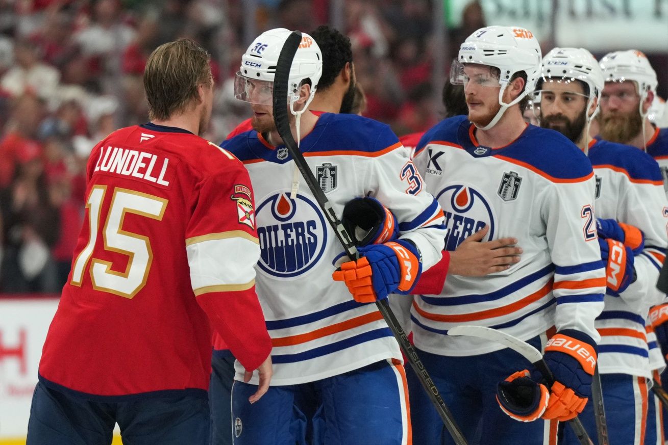 Florida Panthers center Anton Lundell (15) shakes hands with the against the Edmonton Oilers after game six of the 2025 Stanley Cup Final at Amerant Bank Arena.