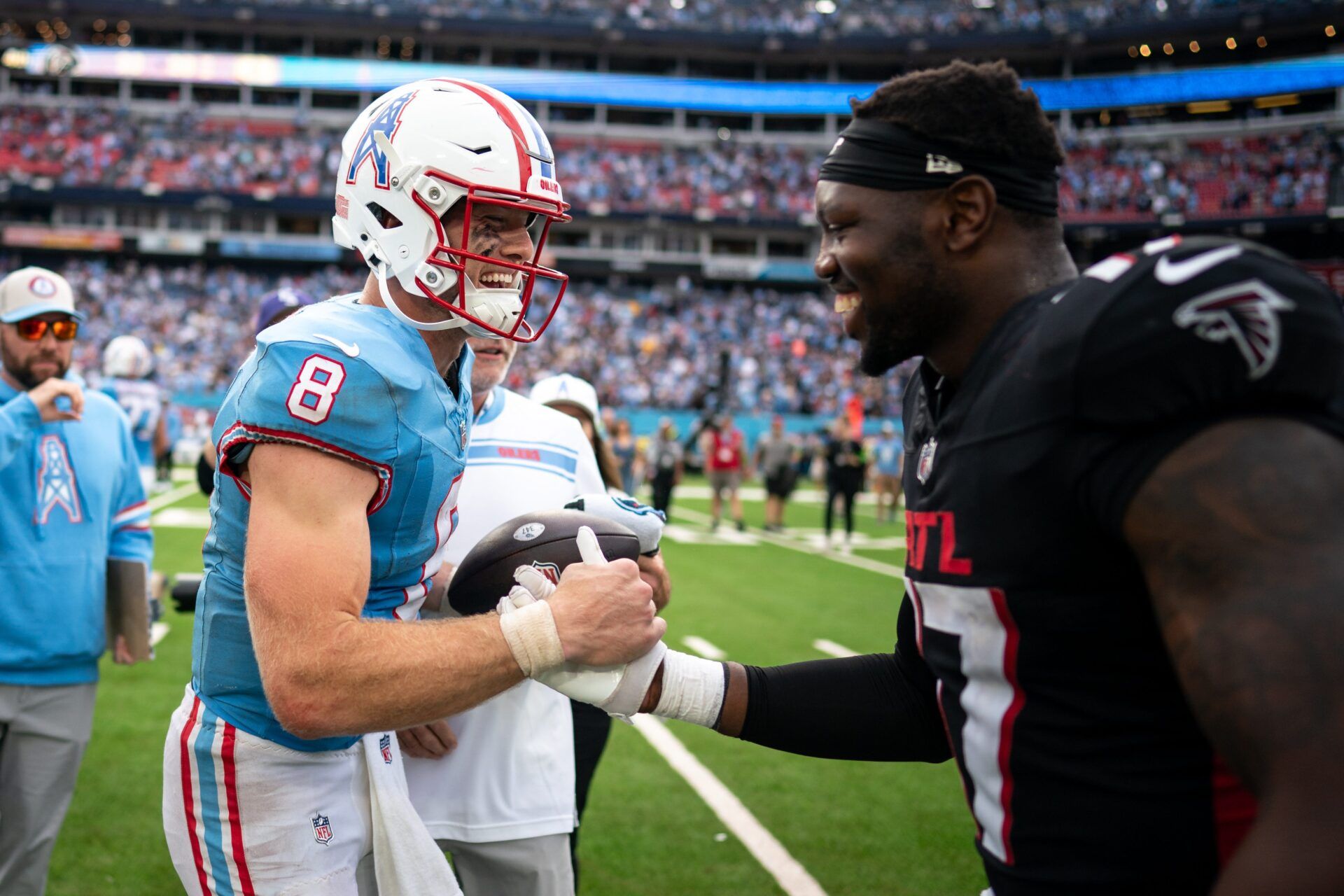 Tennessee Titans quarterback Will Levis (8) greets Atlanta Falcons linebacker Arnold Ebiketie (17) after defeating the Falcons at Nissan Stadium in Nashville, Tenn., Sunday, Oct. 29, 2023.