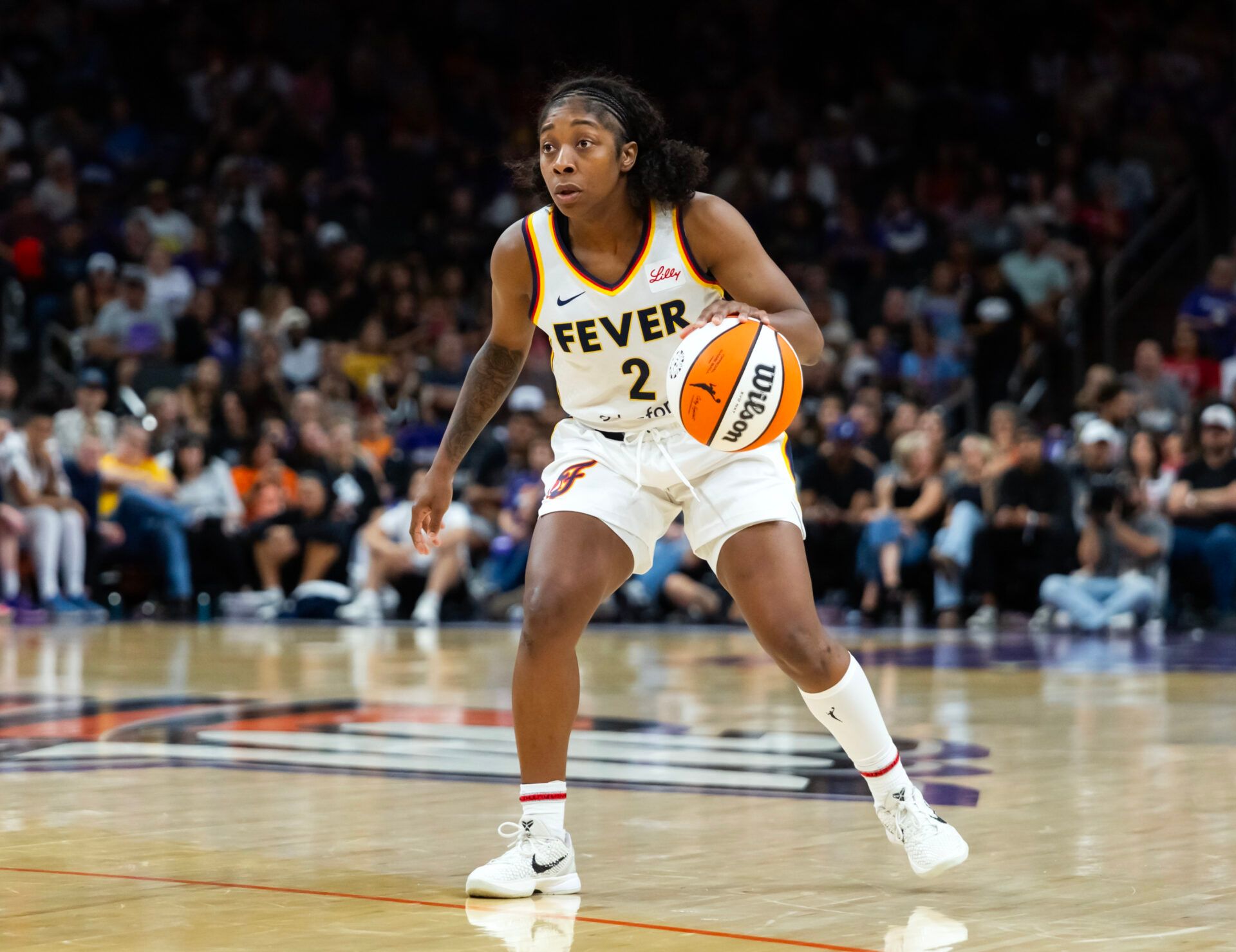 Indiana Fever guard Aari McDonald (2) against the Phoenix Mercury during an WNBA game at PHX Arena.