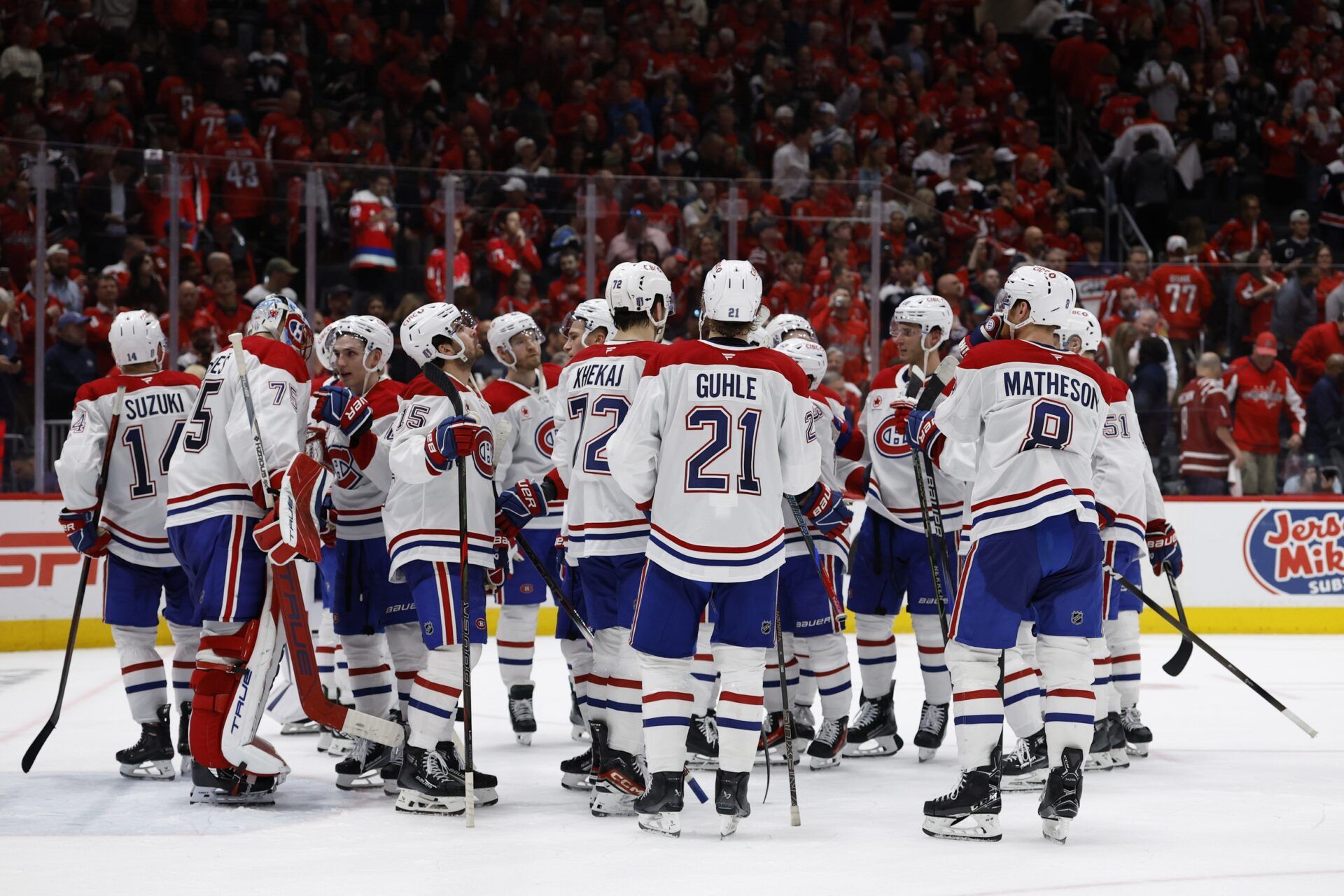 Montreal Canadiens players wait to go through the handshake line after game five of the first round of the 2025 Stanley Cup Playoffs against the Washington Capitals at Capital One Arena.