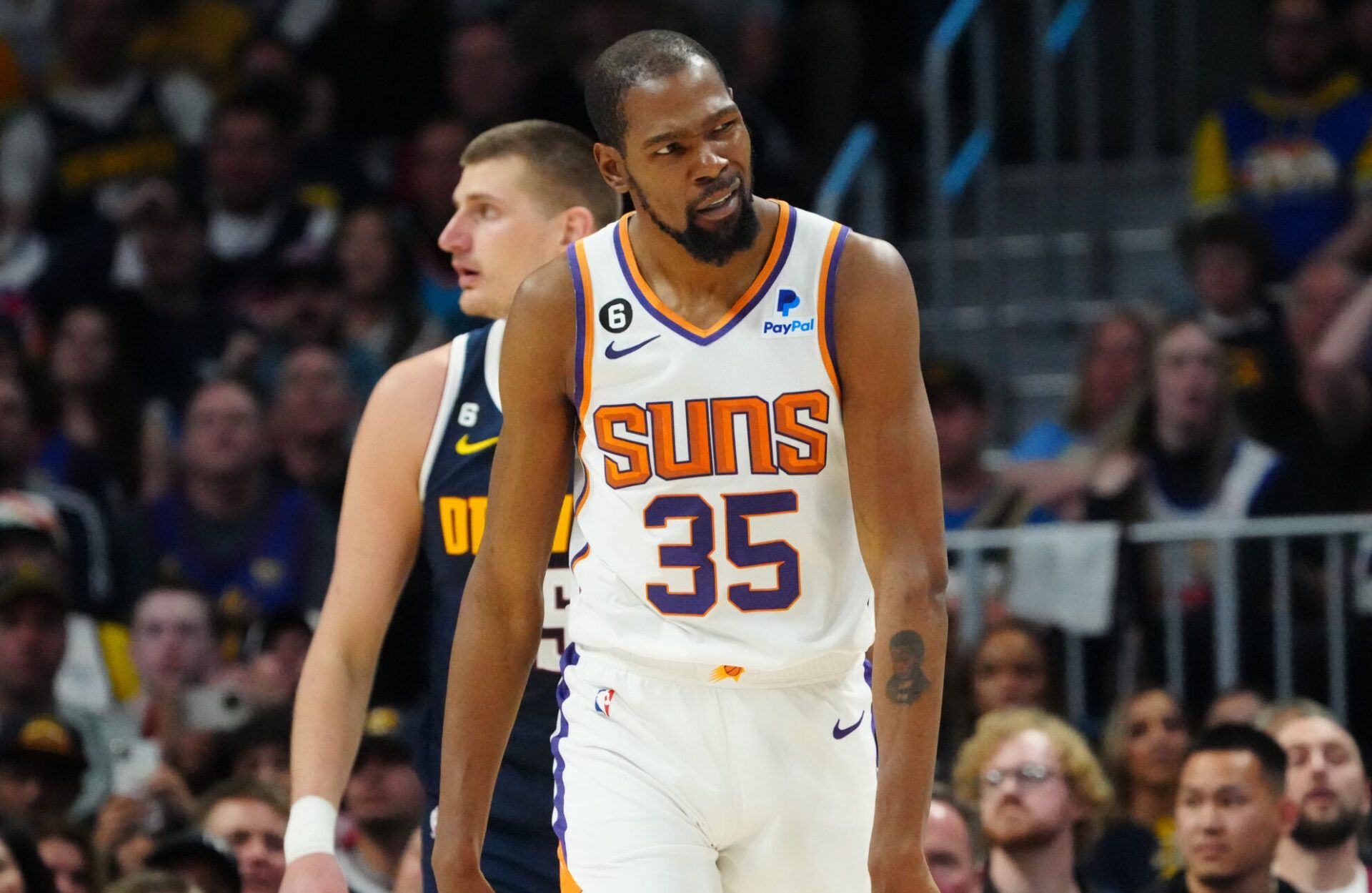 Phoenix Suns forward Kevin Durant (35) reacts after he was fouled by Denver Nuggets center Nikola Jokic (15 in the first half during game two of the 2023 NBA playoffs at Ball Arena.