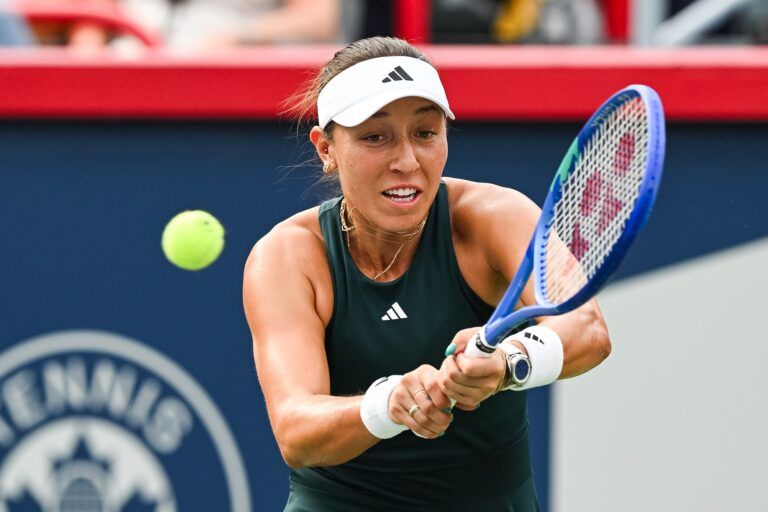Jessica Pegula (USA) returns the ball to Maria Sakkari (GRE) in second round play at IGA Stadium.