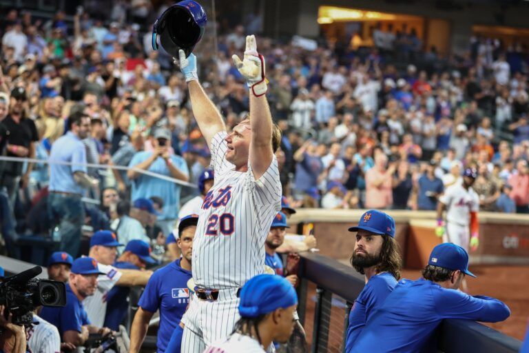 New York Mets first baseman Pete Alonso (20) celebrates after hitting a two run home run to become the all time Mets franchise home run leader in the third inning against the Atlanta Braves at Citi Field.