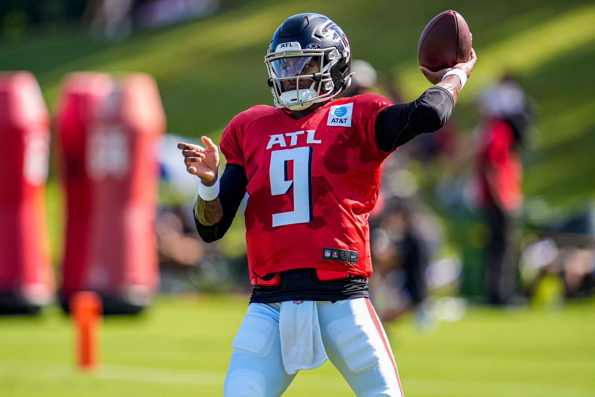 Atlanta Falcons quarterback Michael Penix Jr. (9) passes the ball during practice at training camp at IBM Performance Field.