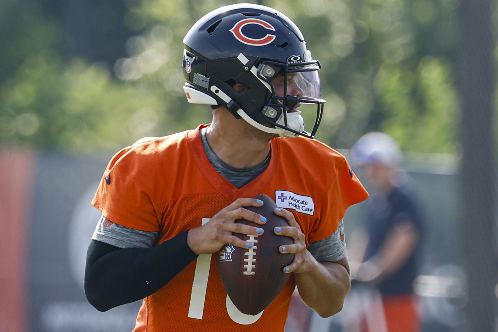Chicago Bears quarterback Caleb Williams (18) looks to pass the ball during training camp at Halas Hall.