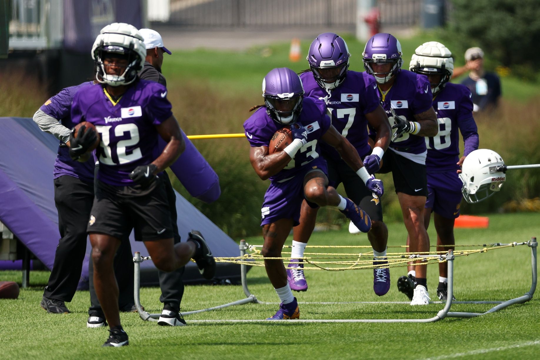 Minnesota Vikings running back Aaron Jones Sr. (33) takes part in drills during the teams training camp at the Minnesota Vikings Training Facility.