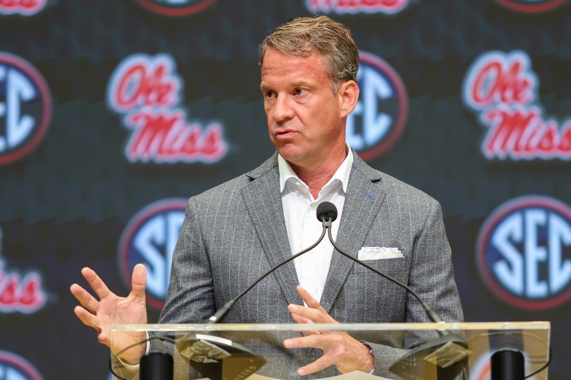 Ole Miss Rebels head coach Lane Kiffin speaks to the media during SEC Media Day at Omni Atlanta Hotel.
