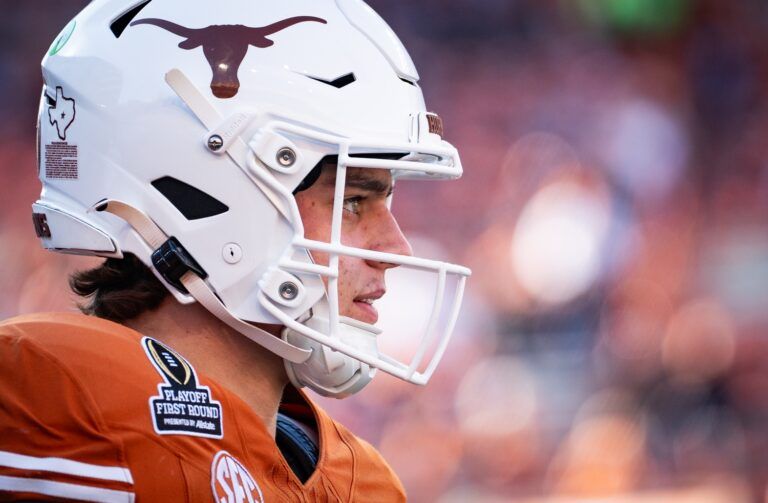 Texas Longhorns quarterback Arch Manning (16) warms up as the Texas Longhorns prepare to play the Clemson Tigers in the first round of the College Football Playoffs at Darrell K Royal Texas Memorial Stadium.
