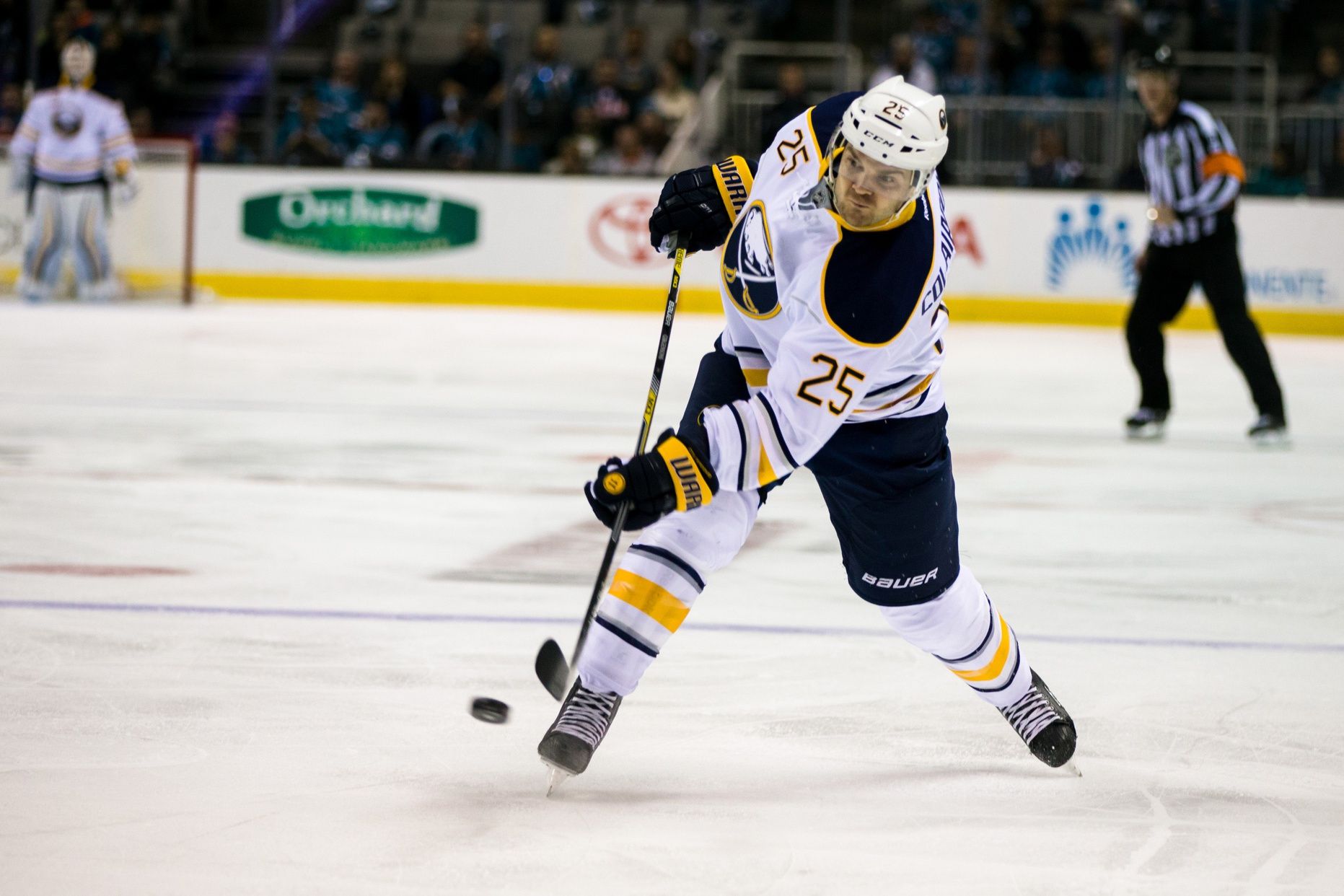 Buffalo Sabres defenseman Carlo Colaiacovo (25) shoots the puck against the San Jose Sharks in the first period at SAP Center at San Jose.