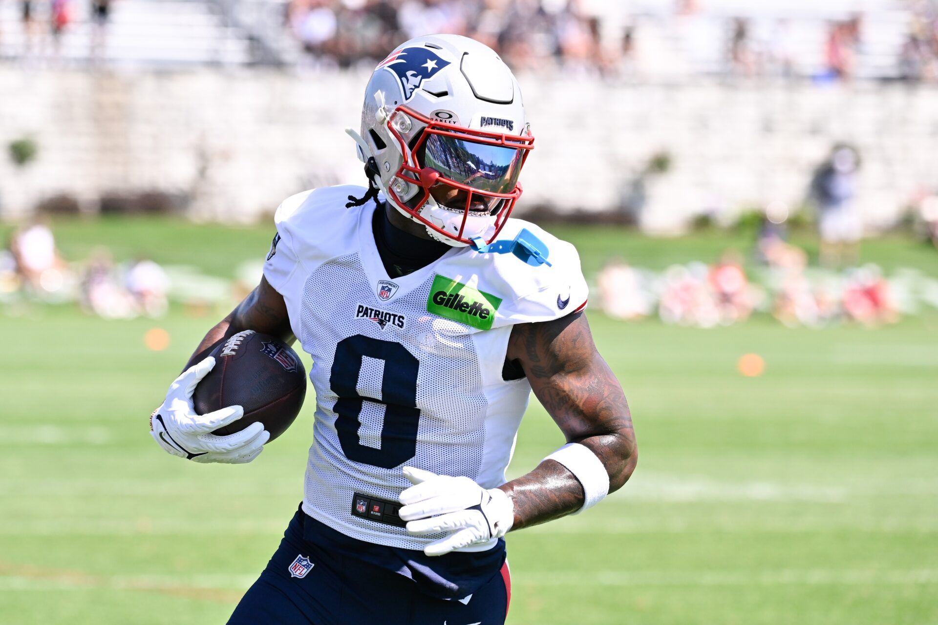New England Patriots wide receiver Stefon Diggs (8) runs after the catch during training camp at Gillette Stadium.