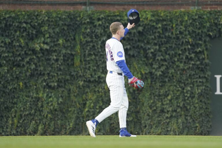 Chicago Cubs outfielder Pete Crow-Armstrong (4) waves to the fans before the game against the Cincinnati Reds at Wrigley Field.