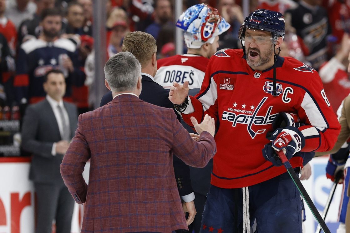 Montreal Canadiens head coach Martin St. Louis (L) shakes hands with Washington Capitals left wing Alex Ovechkin (8) in the handshake line after game five of the first round of the 2025 Stanley Cup Playoffs at Capital One Arena.