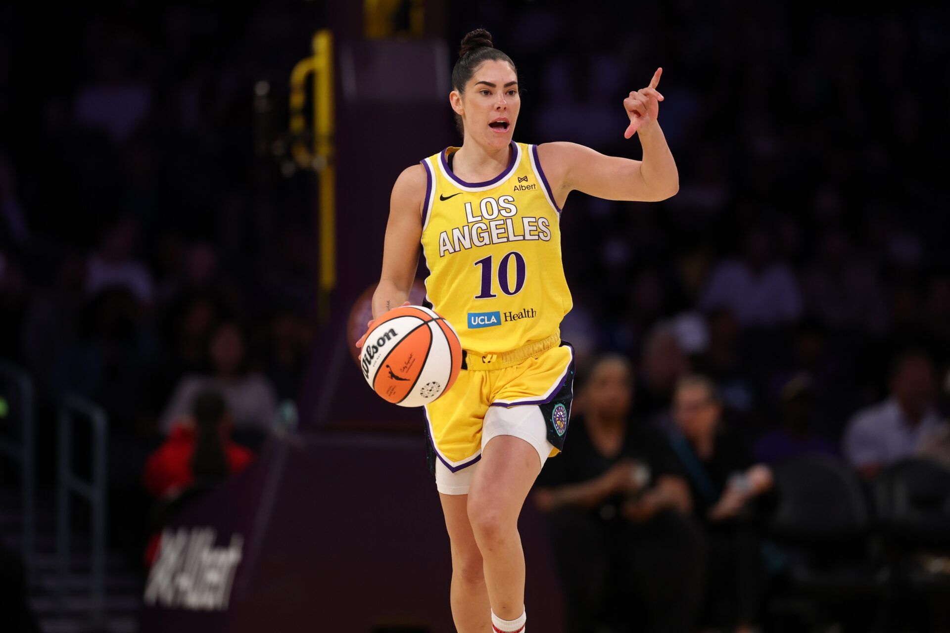 Los Angeles Sparks guard Kelsey Plum (10) dribbles the ball during the first quarter against the New York Liberty at Crypto.com Arena.