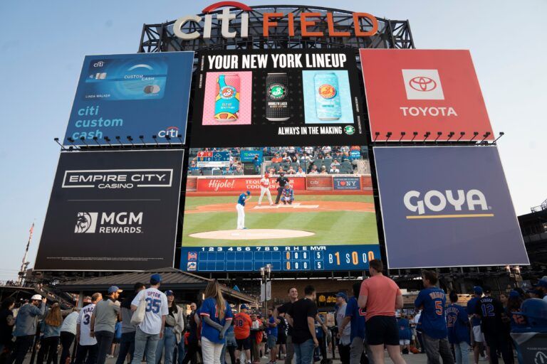 Fans watch a large screen during a Mets vs.Phillies game at Citi Field on Wednesday, May 31, 2023.