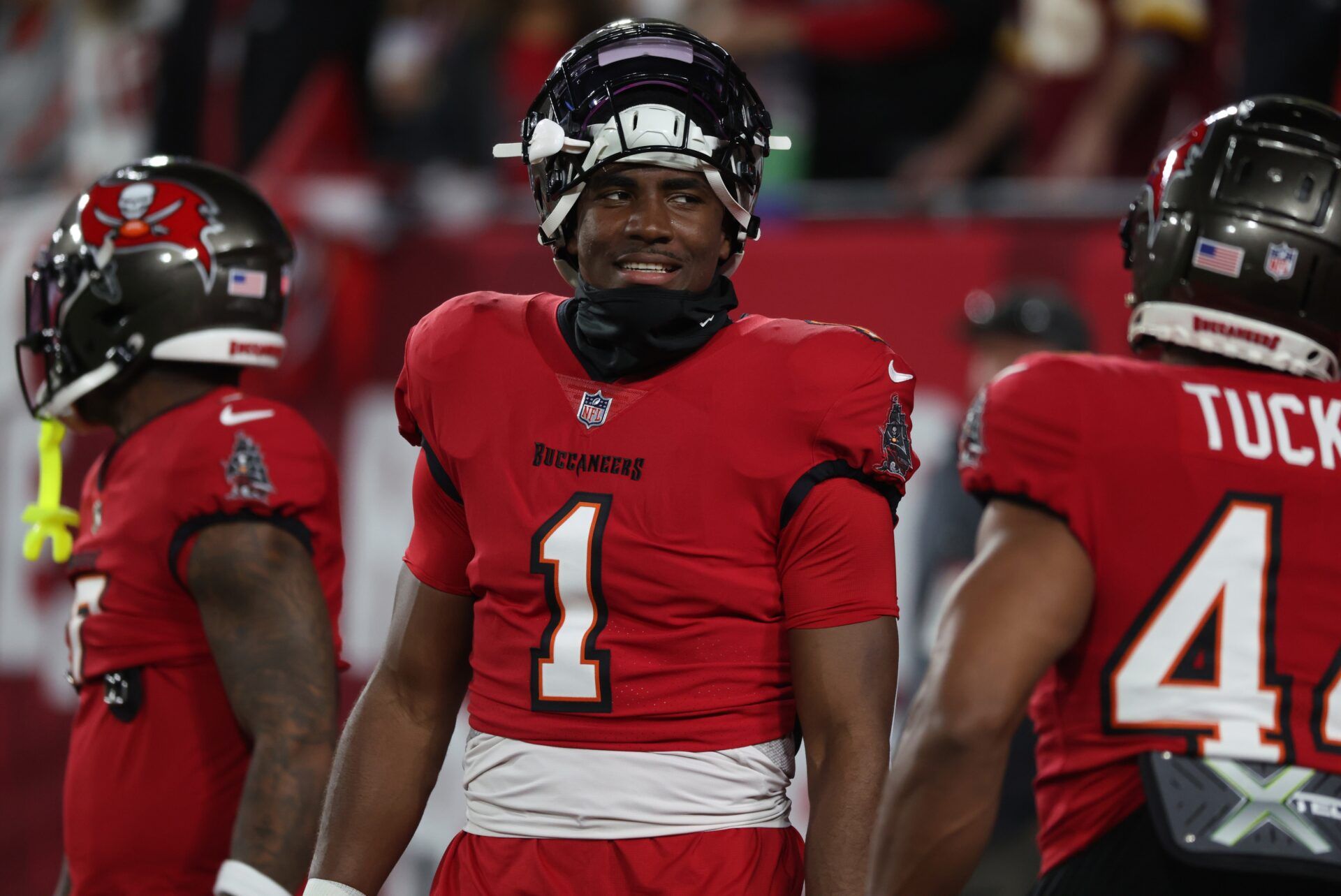 Tampa Bay Buccaneers running back Rachaad White (1) warms up before a NFC wild card playoff against the Washington Commanders at Raymond James Stadium.