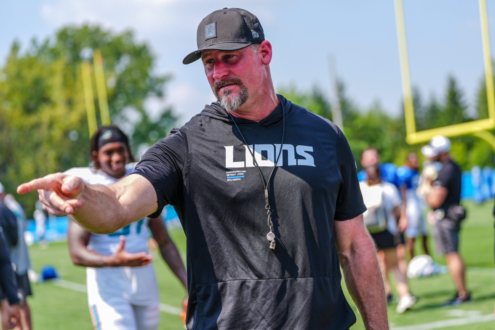 Detroit Lions head coach Dan Campbell talks to staff at the end of the joint practice with the Miami Dolphins at the Lions headquarters and training facility in Allen Park, Thursday, Aug. 14 2025