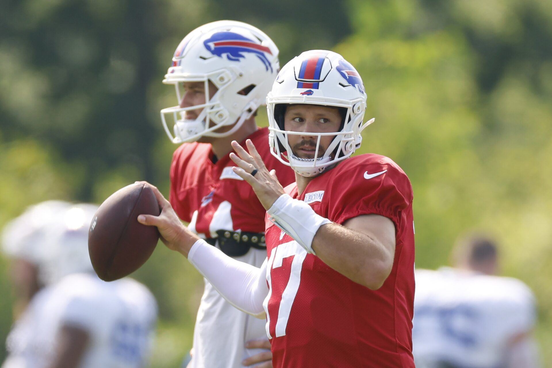 Buffalo Bills quarterback Josh Allen (17) looks to pass the football during joint training camp practice with the Chicago Bears ahead of Sunday's preseason game.