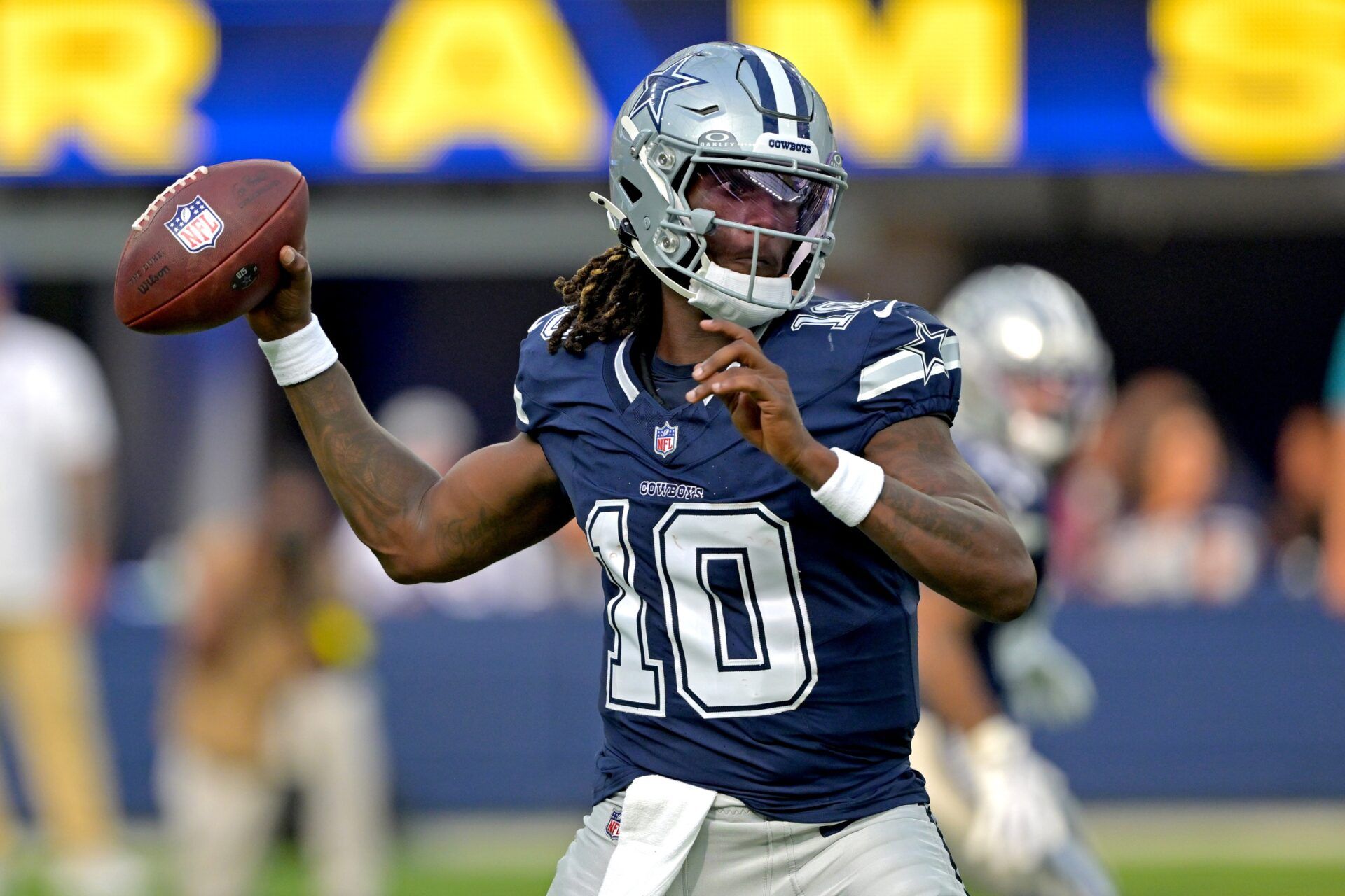 Dallas Cowboys quarterback Joe Milton III (10) throws a pass during the first half against the Los Angeles Rams at SoFi Stadium.