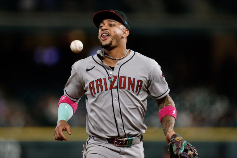 Arizona Diamondbacks second baseman Ketel Marte (4) reacts as he runs to the dugout at the end of the eighth inning against the Colorado Rockies at Coors Field.