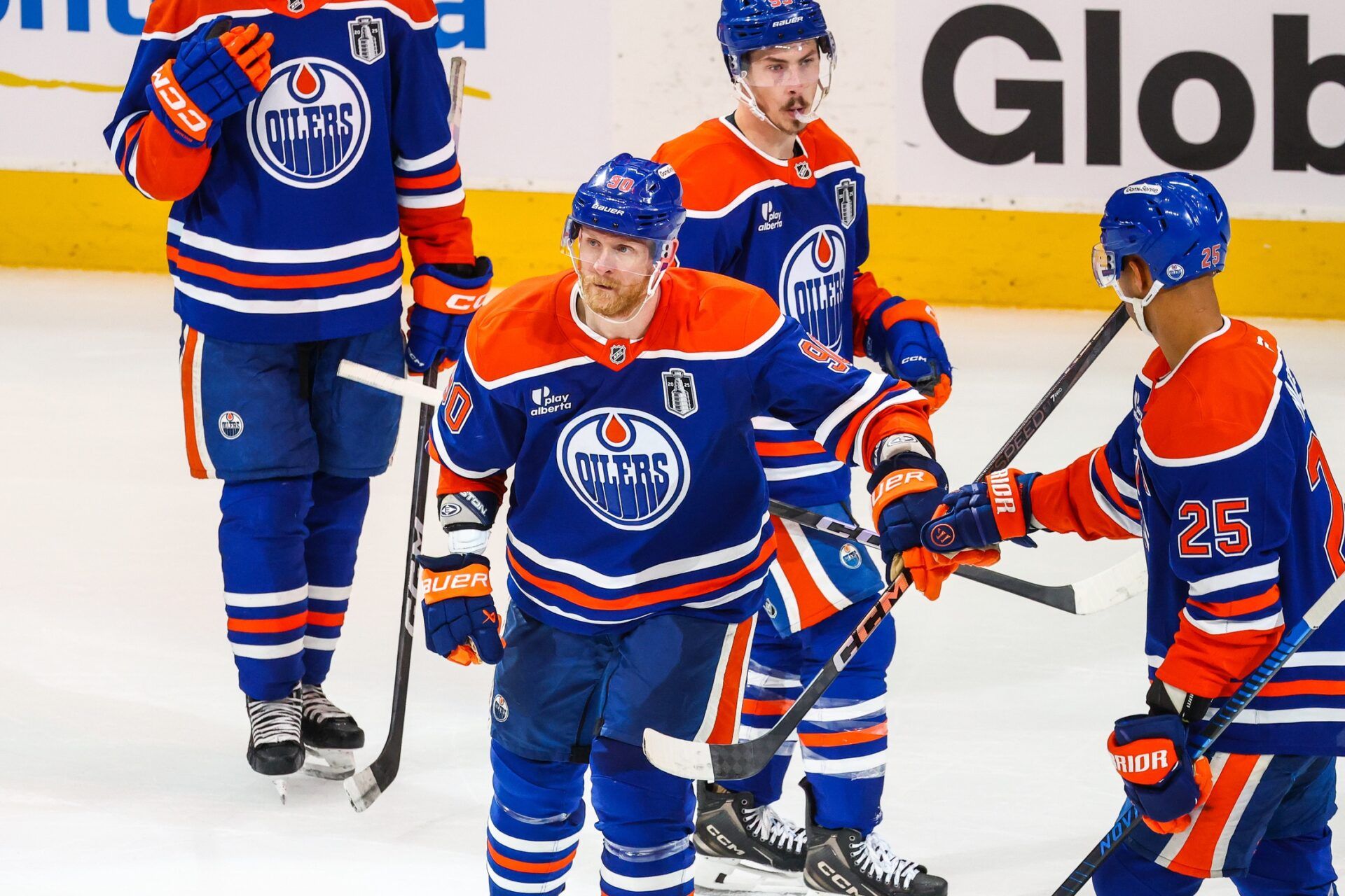 Edmonton Oilers right wing Corey Perry (90) celebrates his goal with teammates against the Florida Panthers during the third period in game five of the 2025 Stanley Cup Final at Rogers Place.