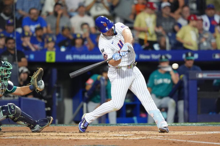 New York Mets infielder Pete Alonso (20) hits a single against the Seattle Mariners in the second inning at Journey Bank Ballpark at Historic Bowman Field.