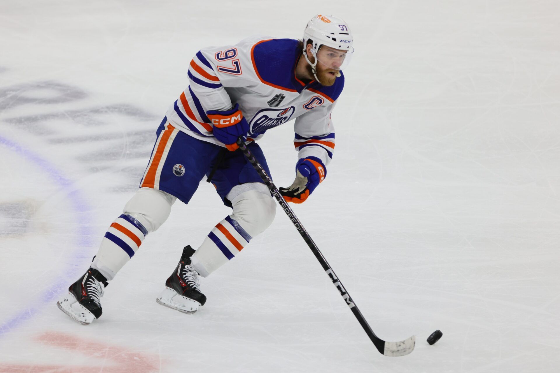 Edmonton Oilers forward Connor McDavid (97) skates with the puck during the first period against the Florida Panthers in game two of the 2024 Stanley Cup Final at Amerant Bank Arena.