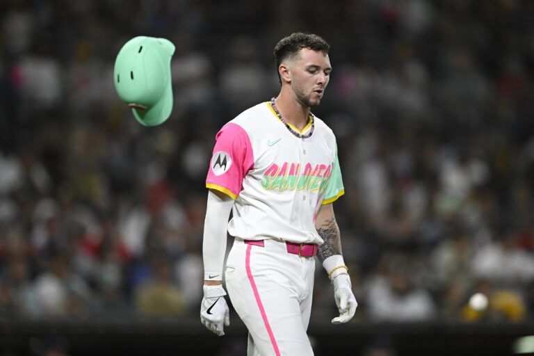 San Diego Padres center fielder Jackson Merrill (3) throws his helmet after grounding out during the fifth inning against the Boston Red Sox at Petco Park.